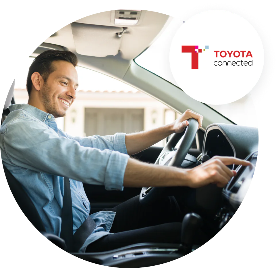 Toyota customer driving a car Toyota customer driving a car