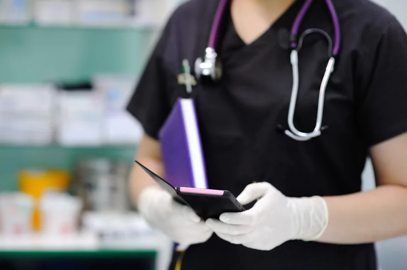 TeleClinic doctor checking their notifications TeleClinic doctor checking their notifications